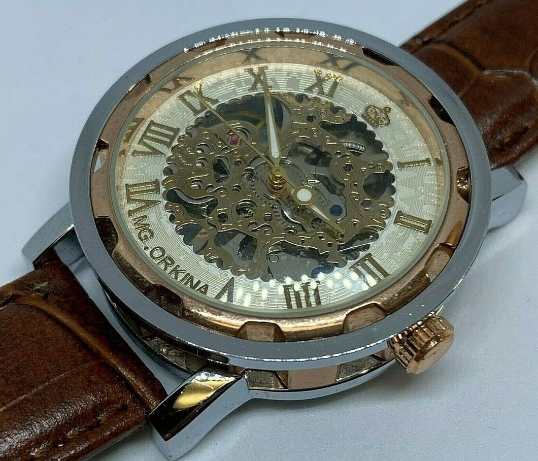 MG ORKINA Mens Dual Tone Skeleton Hand-Wind Mechanical Wind Analog Watch Hours