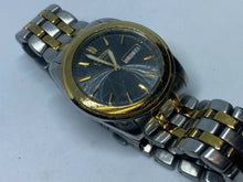 Load image into Gallery viewer, Citizen Eco-Drive E101-S056535 Mens Dual Tone Analog Quartz Watch Hours~Day Date

